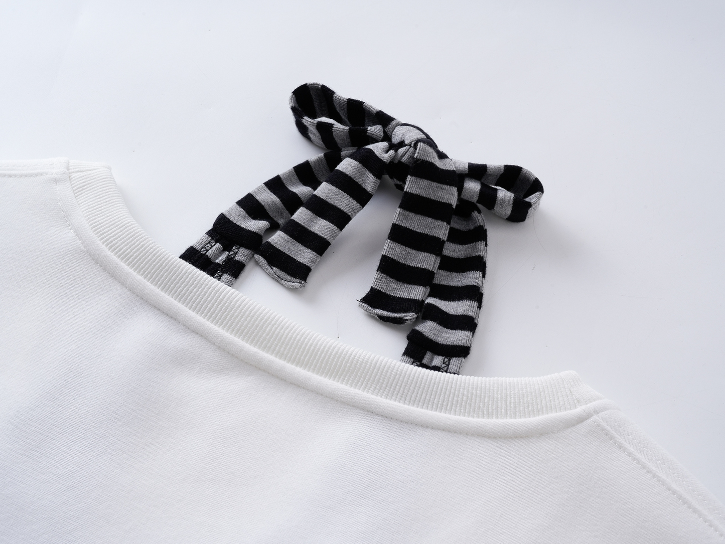 ボーダーフェイクレイヤードオフショルダートップス/2color/cm0134