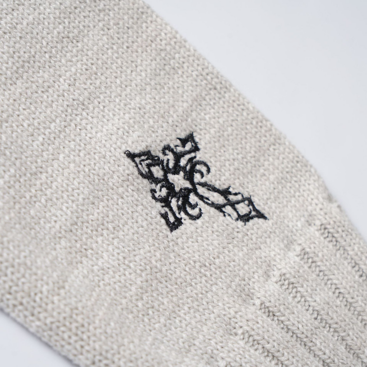 ロゴワンポイントハイネックジップアップニット/cm0124