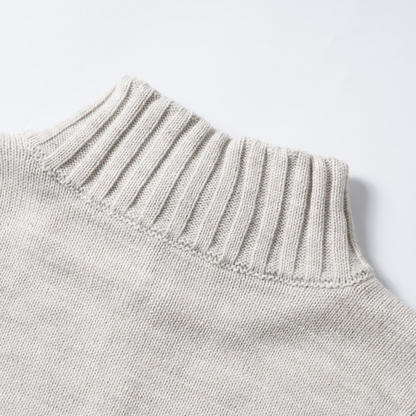 ロゴワンポイントハイネックジップアップニット/cm0124