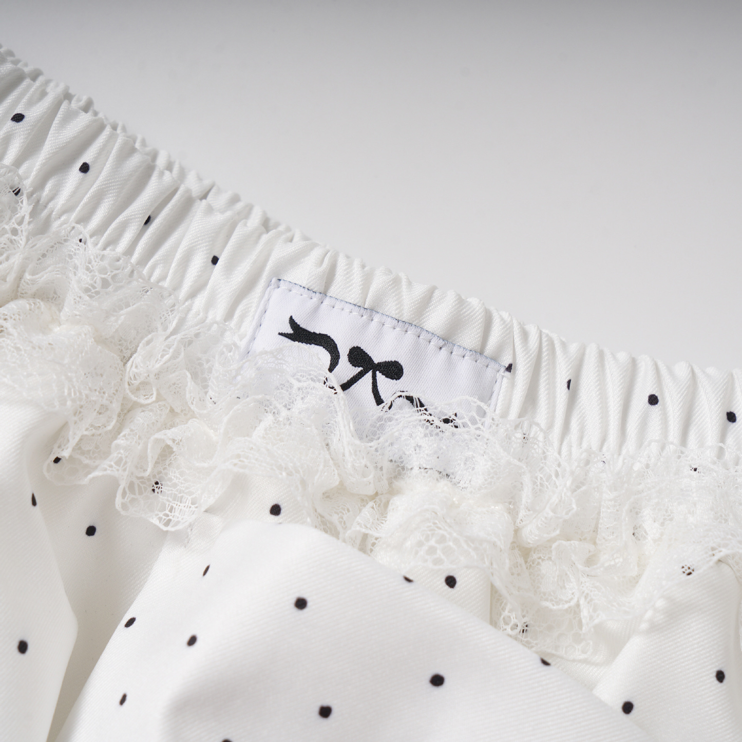 リボンデザインバブルヘム水玉ミニスカート/2color/cm0105